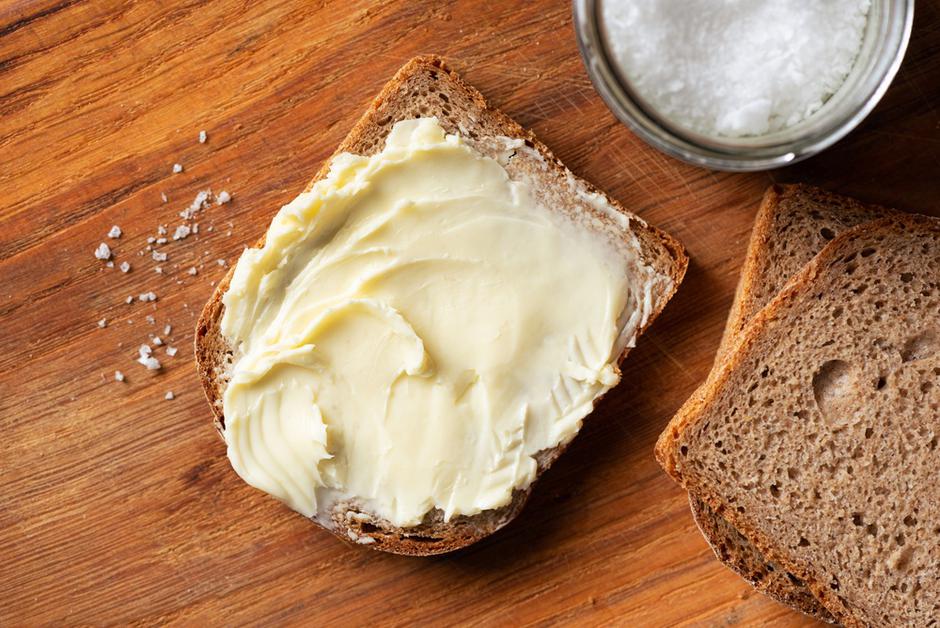 Rye,Bread,With,Butter,On,Wooden,Background.,Top,View | Author: shutterstock