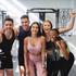 Multicultural,Fitness,Group,Posing,And,Smiling,Looking,At,The,Camera