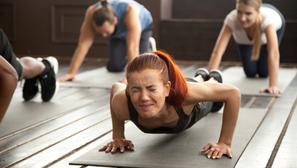 Young,Fit,Sporty,Woman,With,Painful,Face,Expression,Doing,Hard