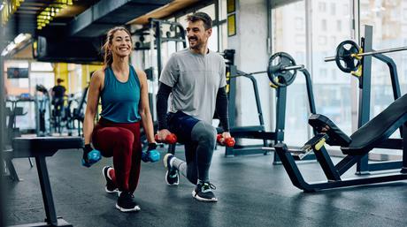 Happy,Athletic,Couple,Having,Weight,Training,In,Lunge,Position,At